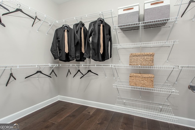 spacious closet with wood finished floors