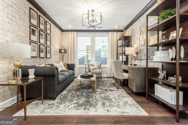 office featuring an inviting chandelier, wood finished floors, crown molding, baseboards, and brick wall