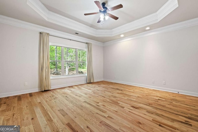 930 Riverside Rd, Roswell, GA 30075 - empty room featuring crown molding, light wood finished floors, a tray ceiling, ceiling fan, and recessed lighting