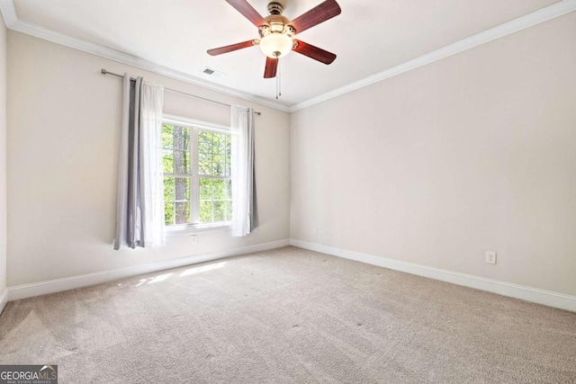 930 Riverside Rd, Roswell, GA 30075 - spare room featuring crown molding, carpet floors, and a ceiling fan