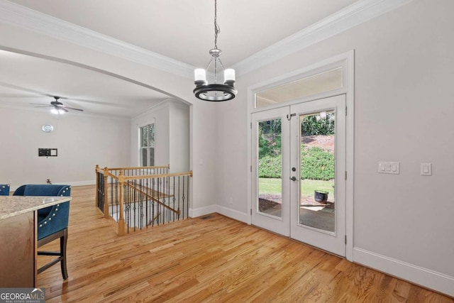 930 Riverside Rd, Roswell, GA 30075 - dining space featuring crown molding, a chandelier, plenty of natural light, and light wood-type flooring