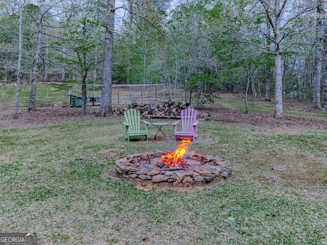 410 Whiskey Still Dr, Cleveland, GA 30528 - view of yard with a fire pit
