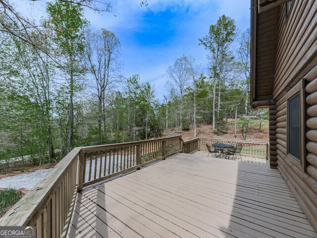 410 Whiskey Still Dr, Cleveland, GA 30528 - wooden terrace with outdoor dining area