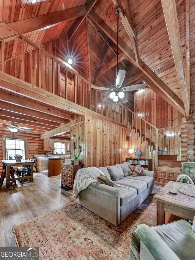 410 Whiskey Still Dr, Cleveland, GA 30528 - living room featuring beamed ceiling, high vaulted ceiling, and ceiling fan