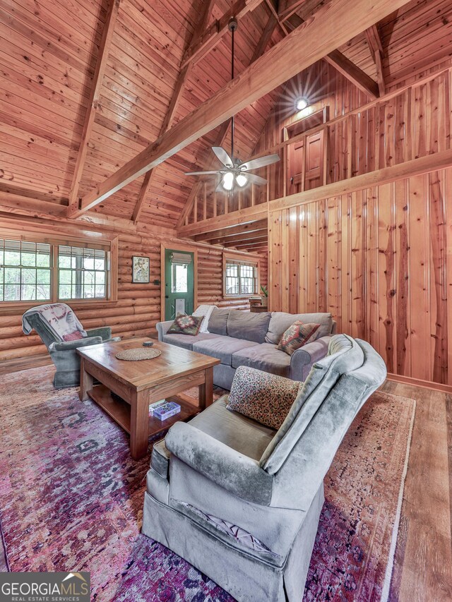 410 Whiskey Still Dr, Cleveland, GA 30528 - living room with wood ceiling, a high ceiling, beam ceiling, and plenty of natural light