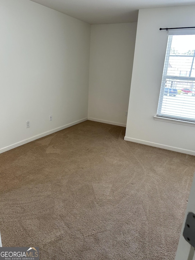 3908 Augustine Pl, Rex, GA 30273 - carpeted spare room with baseboards