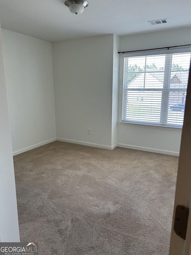 3908 Augustine Pl, Rex, GA 30273 - carpeted empty room with baseboards and visible vents
