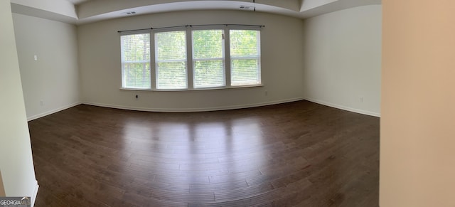 3908 Augustine Pl, Rex, GA 30273 - spare room featuring visible vents, baseboards, and dark wood-style floors