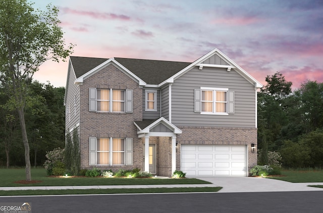 view of front facade with concrete driveway, an attached garage, and brick siding