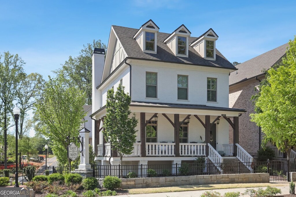 123 Cricket Ln, Alpharetta, GA 30009 - view of front of property with a porch, stairs, fence, and brick siding
