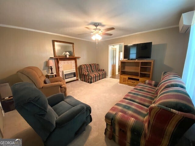 carpeted living room featuring ornamental molding, a fireplace, and ceiling fan