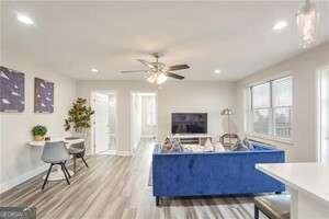 300 Peachtree St NE Unit 5A, Atlanta, GA 30308 - living area with baseboards, a ceiling fan, wood finished floors, and recessed lighting