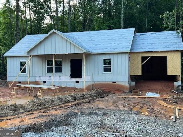 22 Summer Ct, Carrollton, GA 30116 - property in mid-construction with crawl space, board and batten siding, and a wooded view