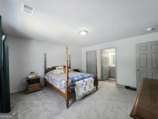 3202 Fairington Village Dr, Lithonia, GA 30038 - carpeted bedroom featuring visible vents and connected bathroom