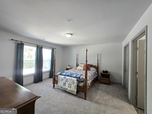 3202 Fairington Village Dr, Lithonia, GA 30038 - bedroom featuring visible vents and light colored carpet