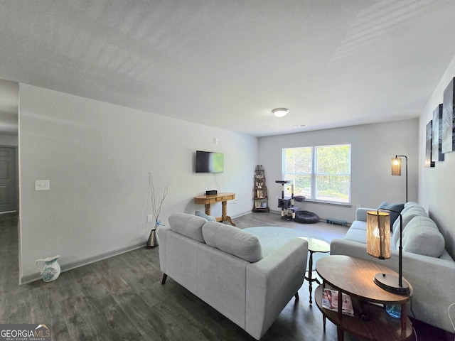 3202 Fairington Village Dr, Lithonia, GA 30038 - living area featuring dark wood finished floors and baseboards