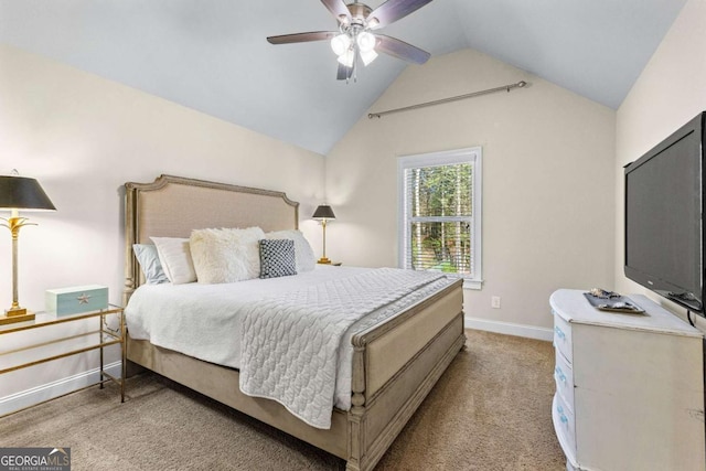 bedroom with baseboards, lofted ceiling, light colored carpet, and a ceiling fan