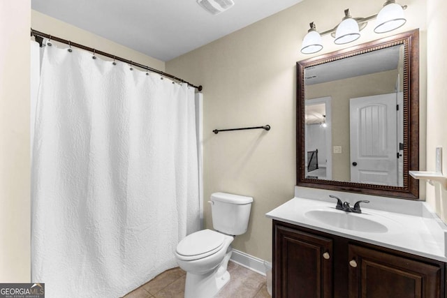 full bathroom with toilet, baseboards, visible vents, tile patterned flooring, and vanity