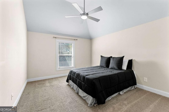 bedroom with vaulted ceiling, baseboards, carpet, and ceiling fan