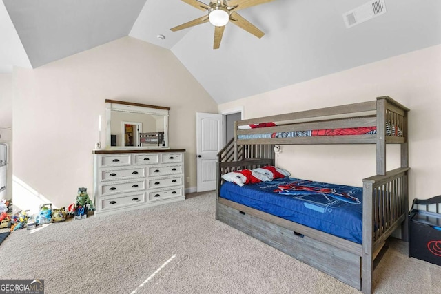 carpeted bedroom featuring vaulted ceiling, visible vents, and ceiling fan