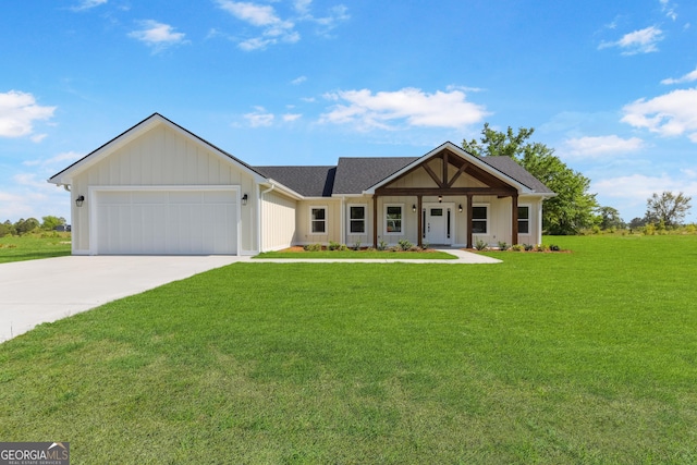 88 Northshore Ave, Jesup, GA 31545 - modern farmhouse style home with a front lawn, driveway, a shingled roof, and a garage