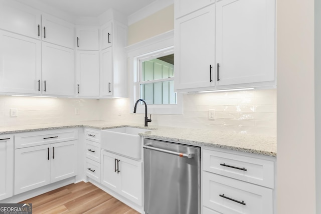 88 Northshore Ave, Jesup, GA 31545 - kitchen with white cabinets, backsplash, dishwasher, and a sink