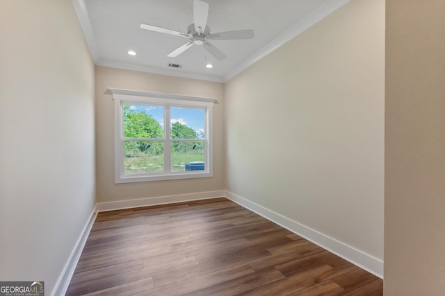 88 Northshore Ave, Jesup, GA 31545 - unfurnished room with dark wood finished floors, a ceiling fan, baseboards, and ornamental molding
