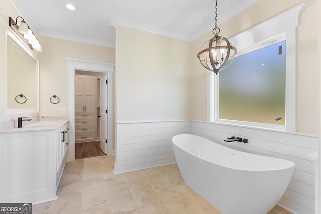 88 Northshore Ave, Jesup, GA 31545 - full bath featuring a notable chandelier, vanity, a freestanding bath, ornamental molding, and recessed lighting
