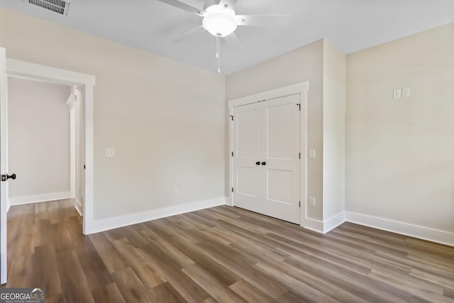 88 Northshore Ave, Jesup, GA 31545 - unfurnished room featuring wood finished floors, visible vents, a ceiling fan, and baseboards