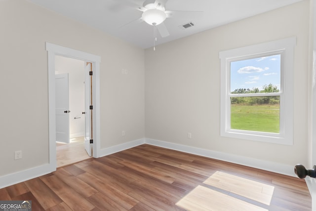 88 Northshore Ave, Jesup, GA 31545 - unfurnished room featuring wood finished floors, baseboards, a ceiling fan, and visible vents