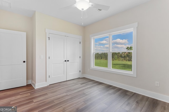 88 Northshore Ave, Jesup, GA 31545 - unfurnished bedroom with baseboards, visible vents, and light wood-type flooring