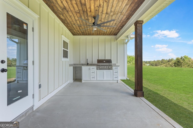 88 Northshore Ave, Jesup, GA 31545 - view of patio with area for grilling, a ceiling fan, and exterior kitchen