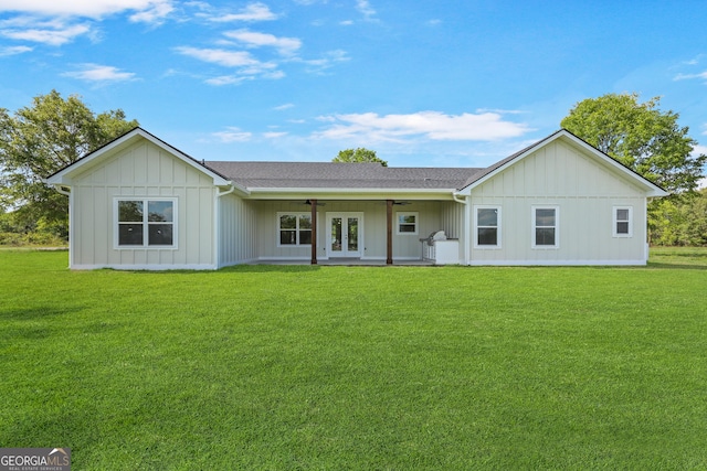 88 Northshore Ave, Jesup, GA 31545 - back of house with french doors, a lawn, ceiling fan, and roof with shingles