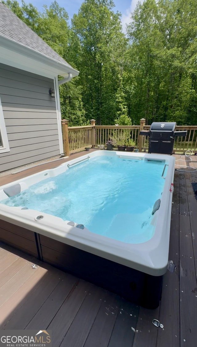 3440 Camelot Way, Loganville, GA 30052 - view of pool with a wooden deck and a grill
