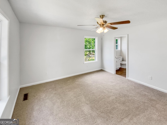 45 Carroll St, Temple, GA 30179 - unfurnished bedroom with carpet floors, visible vents, baseboards, and ensuite bathroom