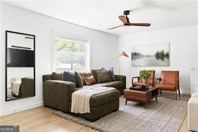 2086 Harold Ave SE, Smyrna, GA 30080 - living area with light wood-style flooring, ceiling fan, and baseboards