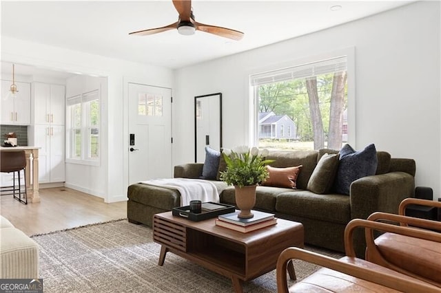 2086 Harold Ave SE, Smyrna, GA 30080 - living room featuring light wood finished floors and a ceiling fan