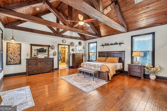 401 Sara Ct, Loganville, GA 30052 - bedroom featuring wooden ceiling, baseboards, lofted ceiling with beams, and hardwood / wood-style flooring