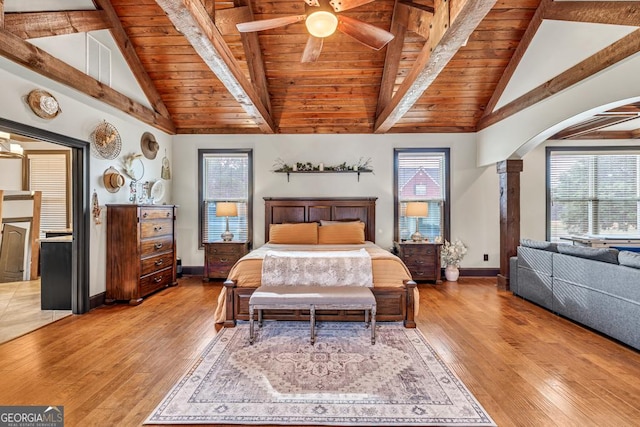 401 Sara Ct, Loganville, GA 30052 - bedroom featuring baseboards, light wood-style flooring, wood ceiling, and beamed ceiling