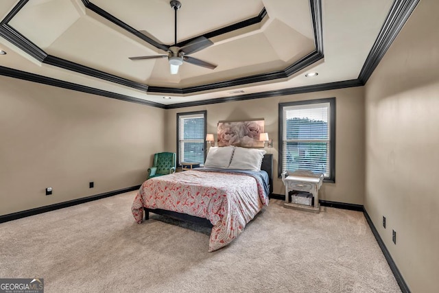 401 Sara Ct, Loganville, GA 30052 - bedroom featuring ornamental molding, baseboards, a raised ceiling, a ceiling fan, and carpet