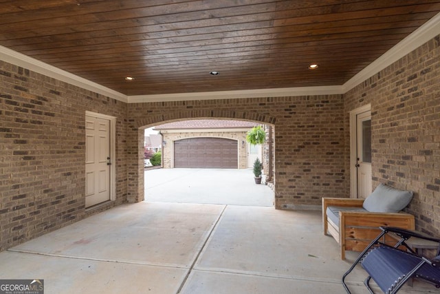 401 Sara Ct, Loganville, GA 30052 - view of patio featuring a garage and driveway