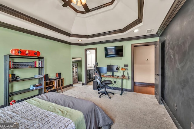 401 Sara Ct, Loganville, GA 30052 - bedroom with visible vents, crown molding, a raised ceiling, baseboards, and carpet flooring
