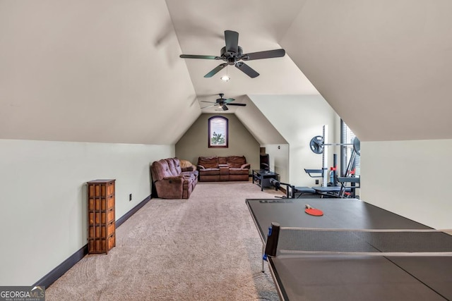 401 Sara Ct, Loganville, GA 30052 - playroom with a ceiling fan, baseboards, vaulted ceiling, and carpet