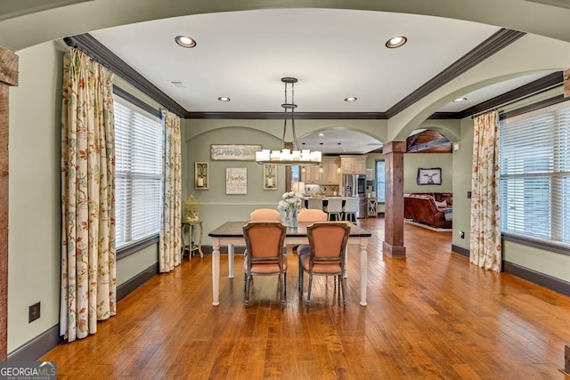 401 Sara Ct, Loganville, GA 30052 - dining area with baseboards, ornamental molding, and ornate columns