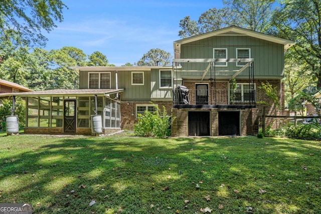 3409 Shorelake Dr, Tucker, GA 30084 - rear view of property with a balcony, an attached garage, brick siding, a lawn, and a sunroom