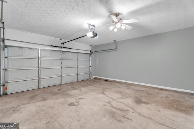 362 Interlake Pass, Mcdonough, GA 30252 - garage featuring baseboards, a garage door opener, and ceiling fan