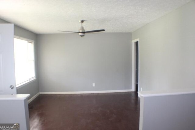2832 Horseshoe Dr, Macon, GA 31211 - unfurnished room featuring a ceiling fan, baseboards, and a textured ceiling