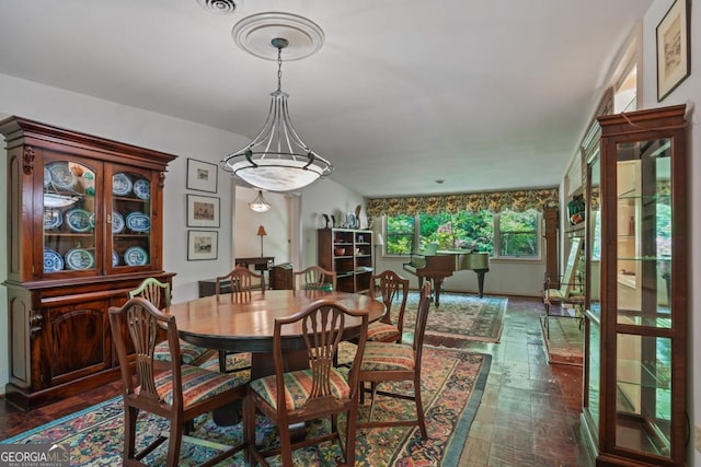 1144 Evergreen Dr NE, Atlanta, GA 30319 - dining area with dark wood-type flooring