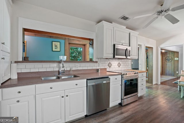 1144 Evergreen Dr NE, Atlanta, GA 30319 - kitchen with visible vents, decorative backsplash, stainless steel appliances, and a sink