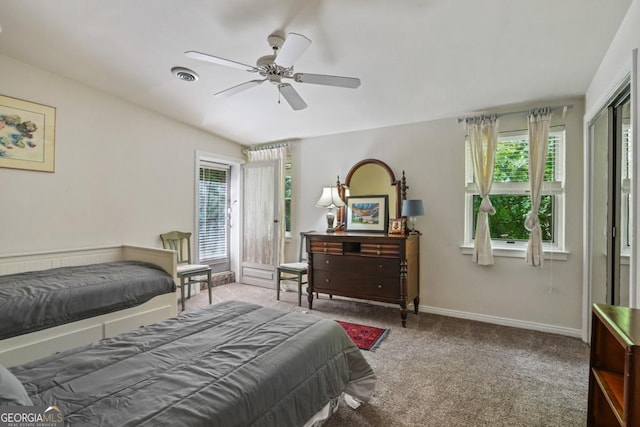 1144 Evergreen Dr NE, Atlanta, GA 30319 - carpeted bedroom with baseboards, visible vents, and ceiling fan